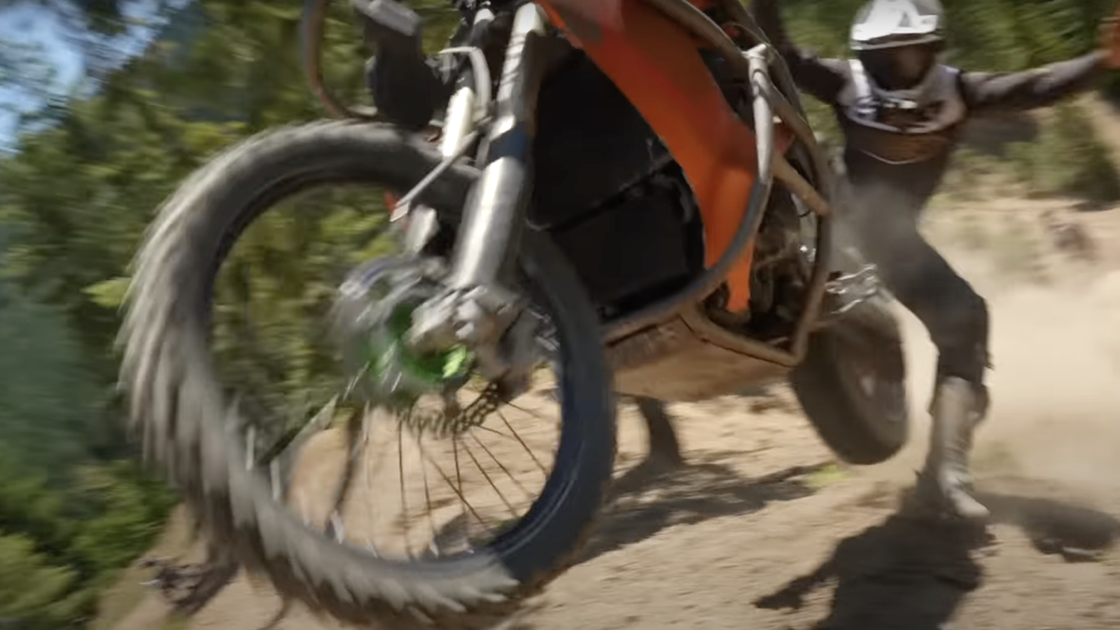 A rider falling off a Suzuki Hayabusa dirt bike